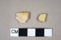 Undecorated yellowware body sherd; Staffordshire slipware body sherd