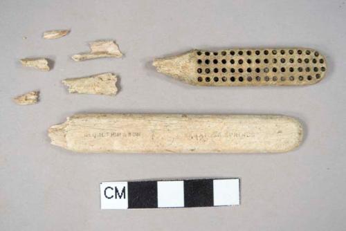 Carved bone toothbrush fragments, incised with manufacturer's information: "GEO. H. FISH & SON SARATOGA SPRINGS"