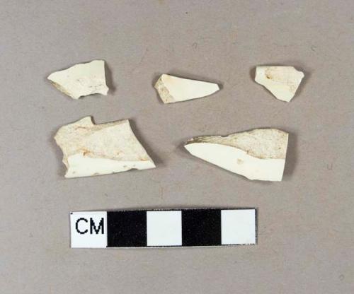 Four undecorated creamware rim sherds, one molded; one undecorated creamware body sherd; two rim sherds crossmend; one body sherd and one rim sherd crossmend