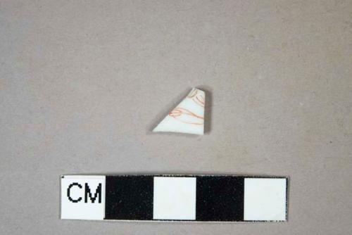 Red hand painted overglaze porcelain body sherd