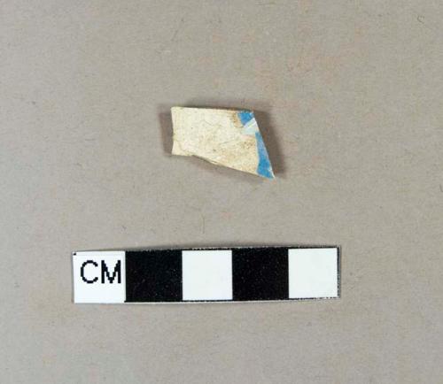 Annular factory decorated pearlware body sherd with blue slip and incised lines