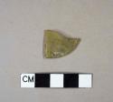 Textured olive green bottle glass fragment