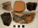 Ceramic, earthenware body and rim sherds, two body sherds incised, one body sherd cord-impressed, one rim sherd with punctate rim and undecorated body, one rim sherd undecorated, one body sherd undecorated, shell-tempered; two body sherds crossmend