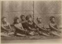 Row of seated women dancing