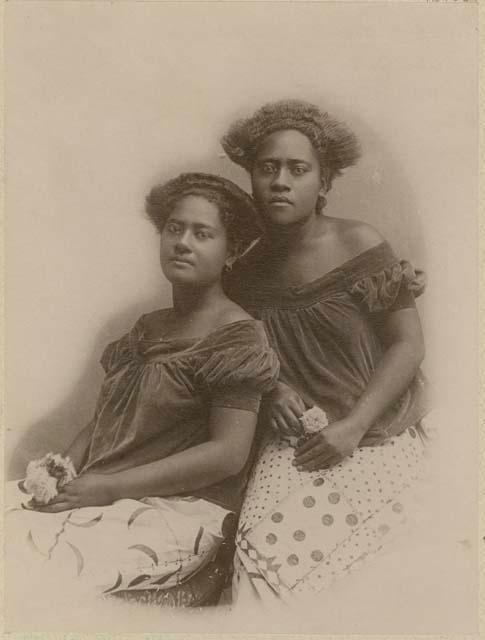 Studio portrait of two princesses