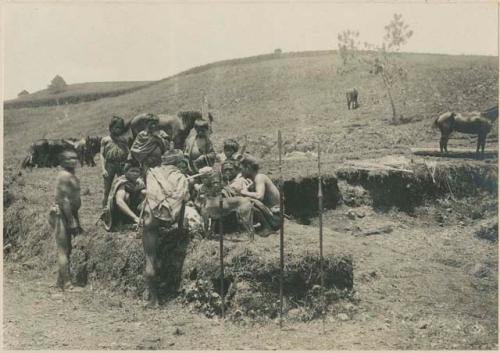 Group of Igorot people cleaning deer