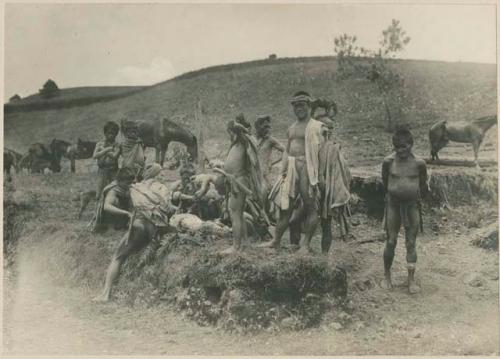 Group of Igorot people cleaning deer