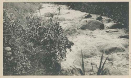 Large irrigation ditch which is carried underneath 5 or 6 large terraces