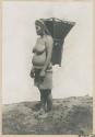 Ifugao woman with carrying basket on her back