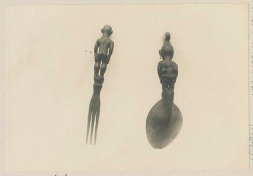 Back view of a carved wooden spoon and fork