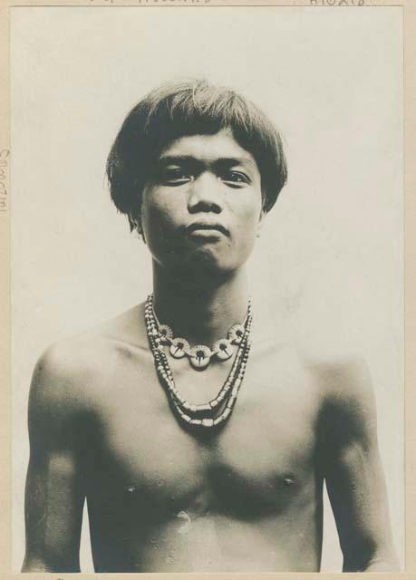 Ifugao man wearing traditional clothing and jewelry