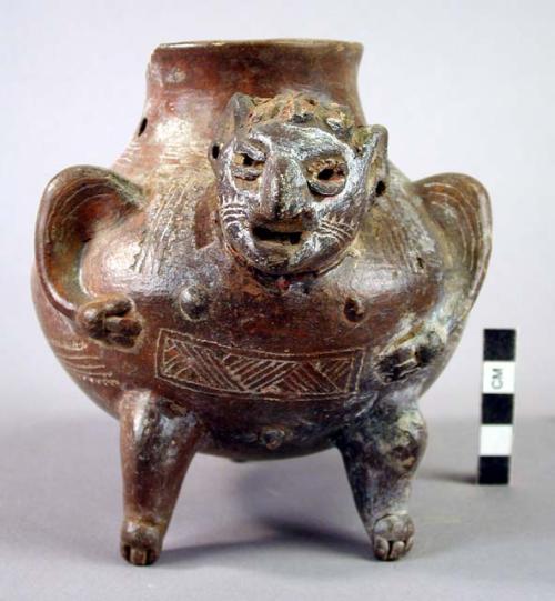 Maroon incised ware effigy jar