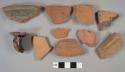 Redware body, rim, and handle sherds; some have lead glaze