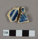 Blue hand painted tin glaze sherds; three sherds crossmend