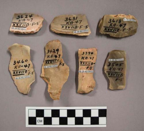 7 flint flakes, some with cortex (including tan, grey and brown colored stone)