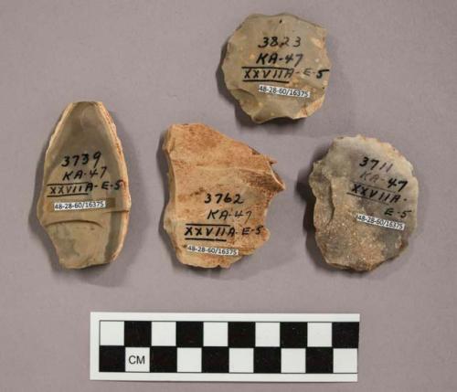 4 flint flakes, including grey and tan colored stone (some with cortex)