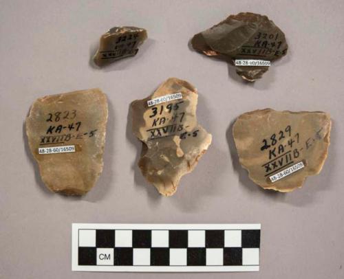 5 flint flakes, including brown and cream colored stone (some with cortex)