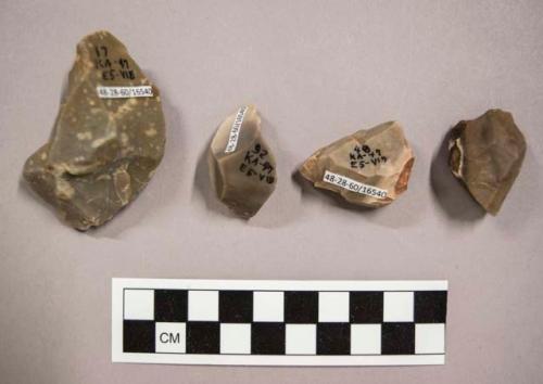 4 flint cores, including grey and brown colored stone (2 with cortex)