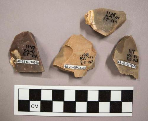 4 flint flakes, including tan, grey and purplish grey colored stone (2 with cortex)