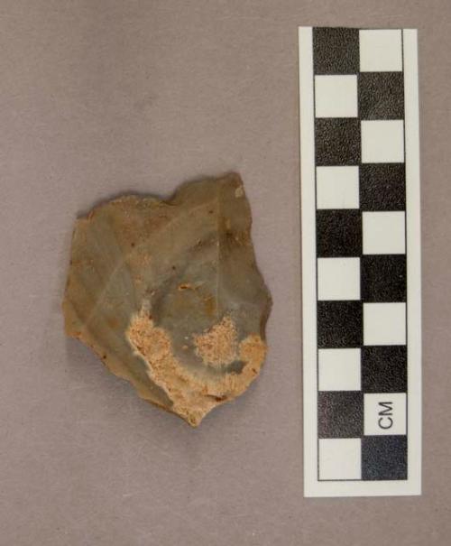 1 flint point, greyish tan colored stone