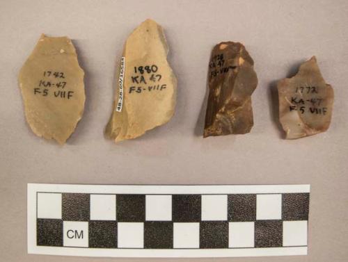 4 flint flakes, tan, brown and grey colored stone (1 with cortex)