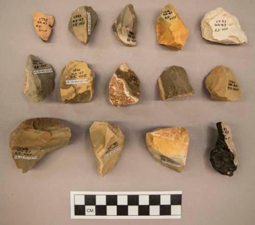 27 flint flakes, including cream, grey, black, tan and brown colored stone (some with cortex)