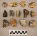 26 flint flakes, including cream, grey, tan, brown, pink and black colored stone (some with cortex)