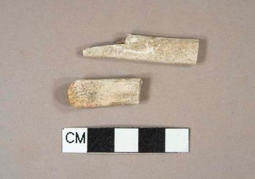 Burned ceramic handle fragments, two fragments crossmend