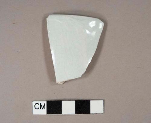 Pearlware rim sherd with molded floral design