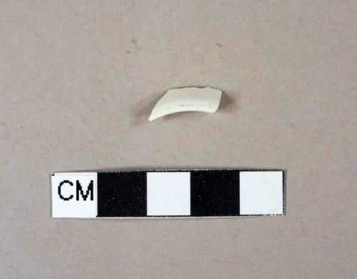 Undecorated pearlware rim sherd, could also possibly be a footring sherd