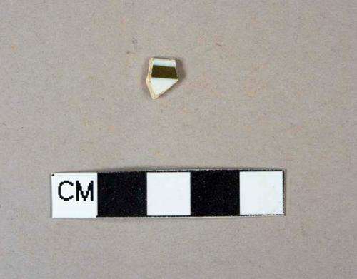 Factory decorated pearlware rim sherd, brown stripe around rim