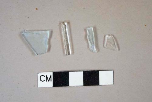 Colorless glass fragments, 3 flat glass fragments, 1 vessel body fragment