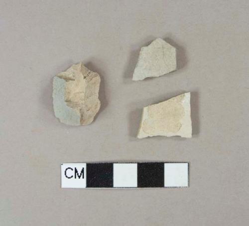 Undecorated gray stoneware body sherds, one has handle attachment