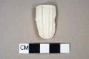 White kaolin pipe bowl fragment, molded ribbed decoration