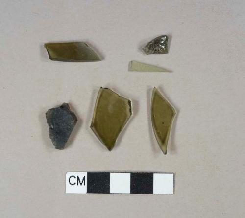 Olive green bottle glass fragments; two fragments crossmend