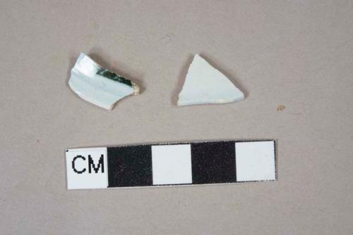 light blue /white pearlware rim fragments, one fragment with green transferprinted decoration