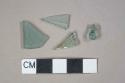 Aqua flat glass fragments, 1 melted unidentified aqua glass fragments