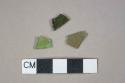 2 Olive green flat glass fragments, 1 bright green vessel glass fragment with raised molded dots