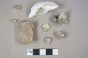 3 unidentified bone fragments, 1 shell fragment (indeterminate), 2 slag fragments, 2 stone fragments