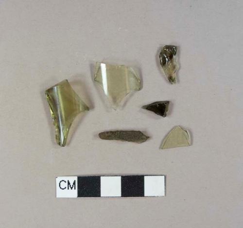 Olive green bottle glass fragments, two crossmend