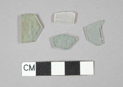 3 aqua flat glass fragments, 1 colorless flat glass fragment