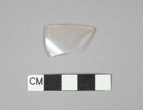 Colorless glass vessel rim fragment, possible tumbler