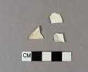 Undecorated creamware body sherds, one possibly molded