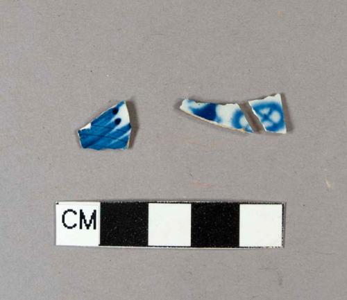 Blue hand painted pearlware body sherds; two crossmend