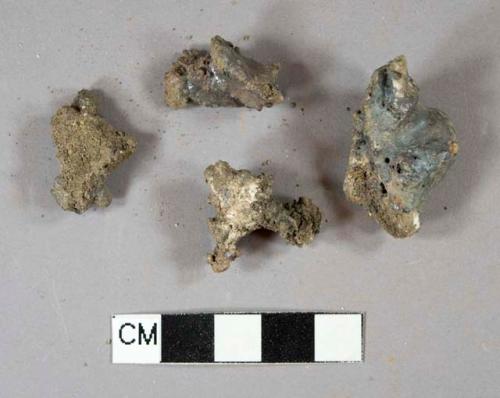 Ferrous metal nail fragments, ferrous unidentified metal fragments, heavily corroded