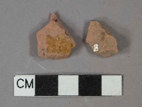 Yellow slip-glazed redware vessel body fragments, Undecorated