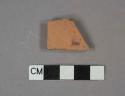 Redware vessel body fragment, unglazed and undecorated