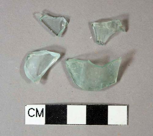 Light aqua likely bottle glass body fragments, multi-sided