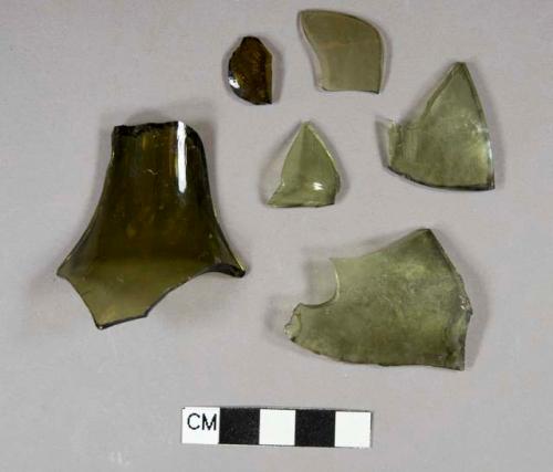 Olive green bottle glass fragments; two crossmend; one neck fragment