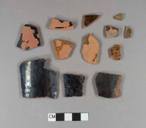 Undecorated lead glazed redware body sherds; two sets of two crossmend